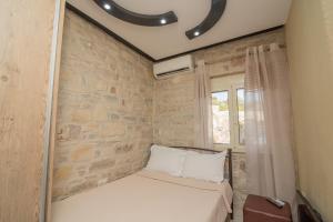 Postel nebo postele na pokoji v ubytování Cretan Nature Villa Alexandra + 37 fotografií