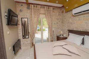 TV a/nebo společenská místnost v ubytování Cretan Nature Villa Alexandra