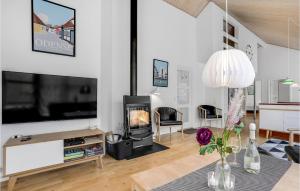 TV/trung tâm giải trí tại Rubinsøen Skovhuse