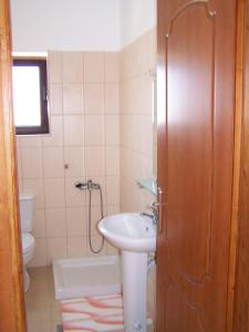 Kúpeľňa v ubytovaní Aptera Hotel