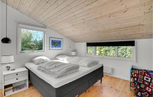 Voodi või voodid majutusasutuse 3 Bedroom Stunning Home In Malling toas