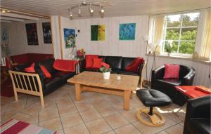 O zonă de relaxare la Holiday Home Blåvand Strand Blåvand Vi