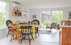 Posezení v ubytování Three-Bedroom Holiday Home In Olsted