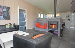 A seating area at Nice Home In Haderslev With 4 Bedrooms, Sauna And Wifi