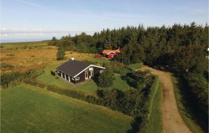 an aerial view of a house on a hill with a road at Nice Home In Skjern With Wifi in Lem