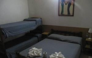 Postel nebo postele na pokoji v ubytování Posada A Lo De Santys