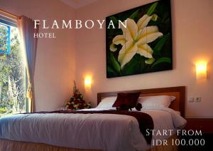 Hotel Flamboyan 객실 침대