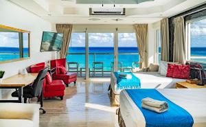 a hotel room with a view of the ocean at Paradise Beachfront & Nightlife Heart in Cancún