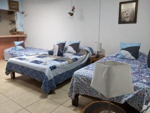 Postel nebo postele na pokoji v ubytování Guesthouse Casa Lapa2