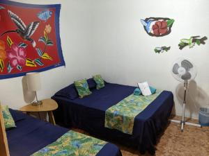 Postel nebo postele na pokoji v ubytování Guesthouse Casa Lapa2