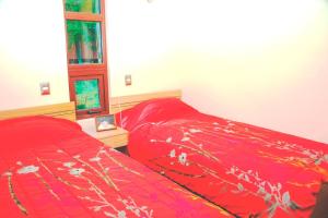 Cama o camas de una habitación en Cabañas Lagosur