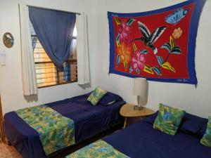 Postel nebo postele na pokoji v ubytování Guesthouse Casa Lapa2