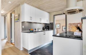 Η κουζίνα ή μικρή κουζίνα στο Holiday Home Fanø 59
