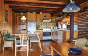 Η κουζίνα ή μικρή κουζίνα στο Holiday Home Hvide Sande 34
