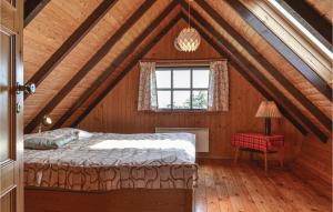 Ένα ή περισσότερα κρεβάτια σε δωμάτιο στο Holiday Home Hvide Sande 34