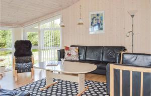 Posezení v ubytování Holiday Home Kongeørnen Storvorde Xi + 10 fotografií