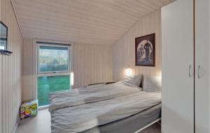 Postel nebo postele na pokoji v ubytování Amazing Home In Tarm With Kitchen