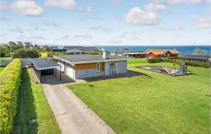 a house with a large yard with a playground at Amazing Home In Slagelse With Wifi in Slagelse