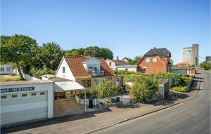 an aerial view of a residential neighbourhood with houses at Cozy Home In Stubbekøbing With Kitchen in Stubbekøbing +13 photos