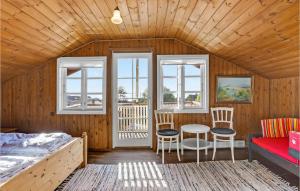 Postel nebo postele na pokoji v ubytování Strandly