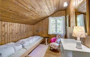 Postel nebo postele na pokoji v ubytování Strandly