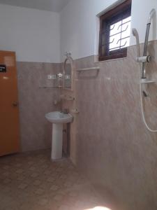 Koupelna v ubytování Margosa Guesthouse