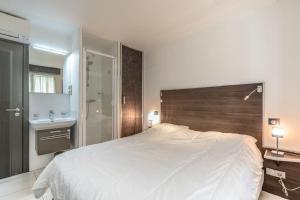 En eller flere senge i et værelse på Croisette: 2BDR Apartment