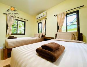 Postel nebo postele na pokoji v ubytování ViangPhing Resort