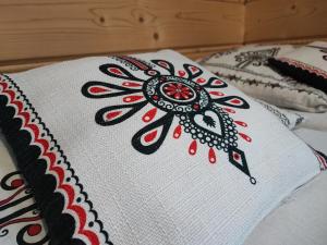 Łóżko lub łóżka w pokoju w obiekcie Zakopianskie Pokoje u Eweliny