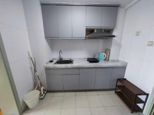 A kitchen or kitchenette at iNestin Shanghai Apt Xinjinqiao Road