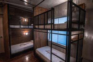 Postel nebo postele na pokoji v ubytování CONNECTOR Hostel