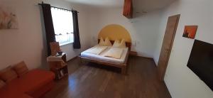 Кровать или кровати в номере Kornihof