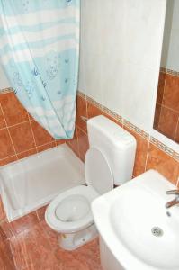 Koupelna v ubytování Village House