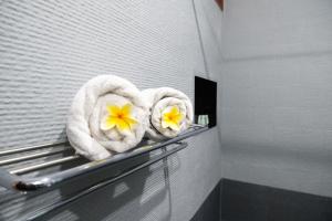 TV a/nebo společenská místnost v ubytování Vidi Boutique Hotel