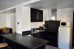 Kuchnia lub aneks kuchenny w obiekcie Appartement 6 personnes, les 3 vallées, près des Thermes