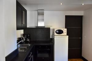 Kuchnia lub aneks kuchenny w obiekcie Appartement 6 personnes, les 3 vallées, près des Thermes