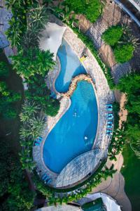 an overhead view of a swimming pool in a resort at Crowne Plaza Huizhou, an IHG Hotel in Huizhou