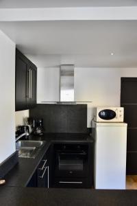 Kuchnia lub aneks kuchenny w obiekcie Appartement 6 personnes, les 3 vallées, près des Thermes