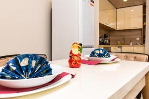 Kuchyň nebo kuchyňský kout v ubytování Sunny 1BD Apartment in OLD TOWN by Flat Mаnager + 12 fotografií