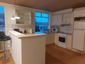 Kuchyň nebo kuchyňský kout v ubytování Venos home