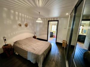 Łóżko lub łóżka w pokoju w obiekcie Appartement 6 personnes, les 3 vallées, près des Thermes