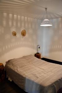 Łóżko lub łóżka w pokoju w obiekcie Appartement 6 personnes, les 3 vallées, près des Thermes