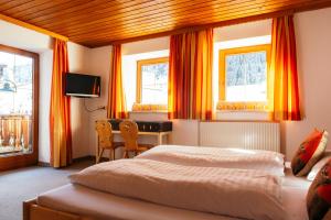 Postel nebo postele na pokoji v ubytování Pension Steinkogel