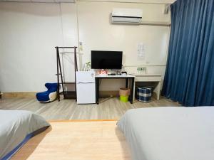 Uma televisão e/ou sistema de entretenimento em 郵系空間民宿