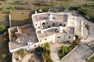 an overhead view of a large white house at Masseria Ruri Pulcra in Patù