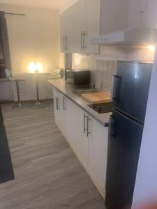 Kuchyňa alebo kuchynka v ubytovaní Charmant appartement 2 chambres dans le centre historique