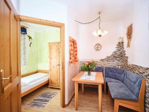 Postel nebo postele na pokoji v ubytování Zwergerlhof