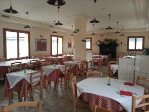 A restaurant or other place to eat at La Locanda di San Biagio