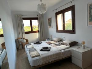 Postel nebo postele na pokoji v ubytování Casa Mirador - Bonita casa pareada