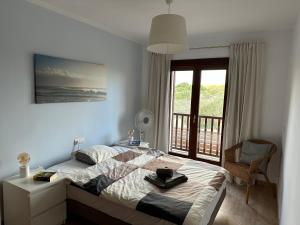 Postel nebo postele na pokoji v ubytování Casa Mirador - Bonita casa pareada